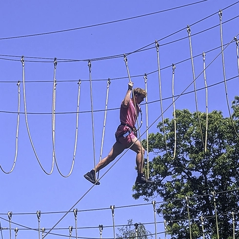 adult on high ropes course